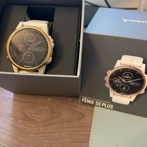 Garmin Fenix 5S sapphire series watch.  In excellent condition.